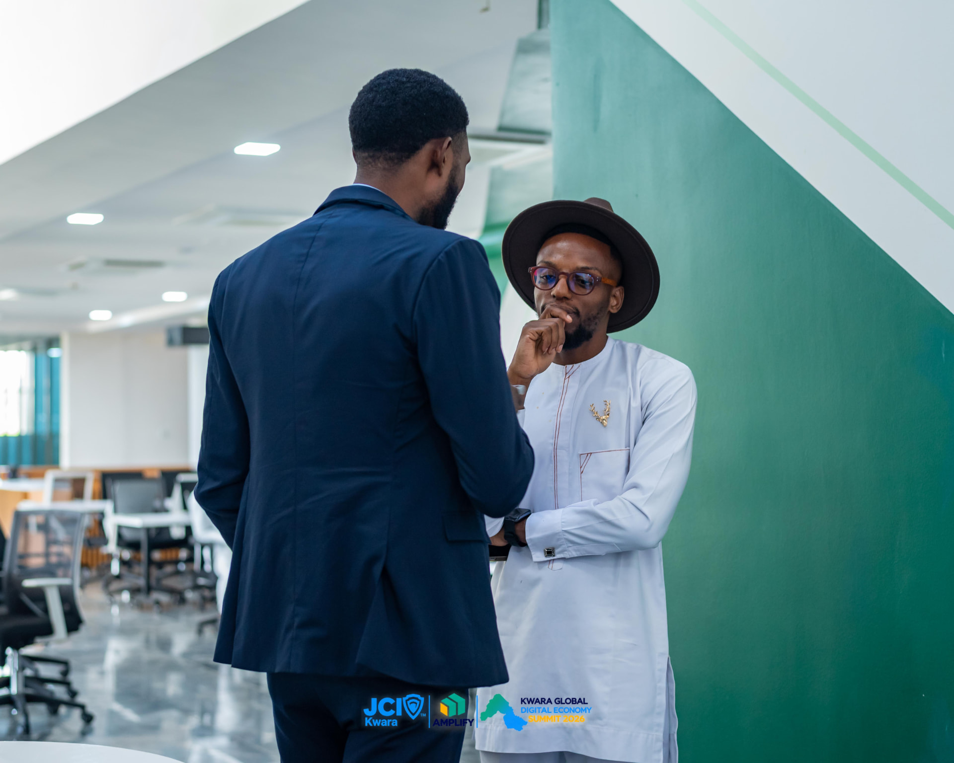 Daniel connecting with a fellow community member at an event